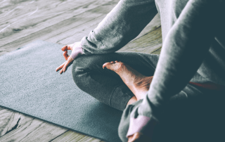A woman practices yoga