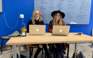 Two biocbd+ employees working on their laptops